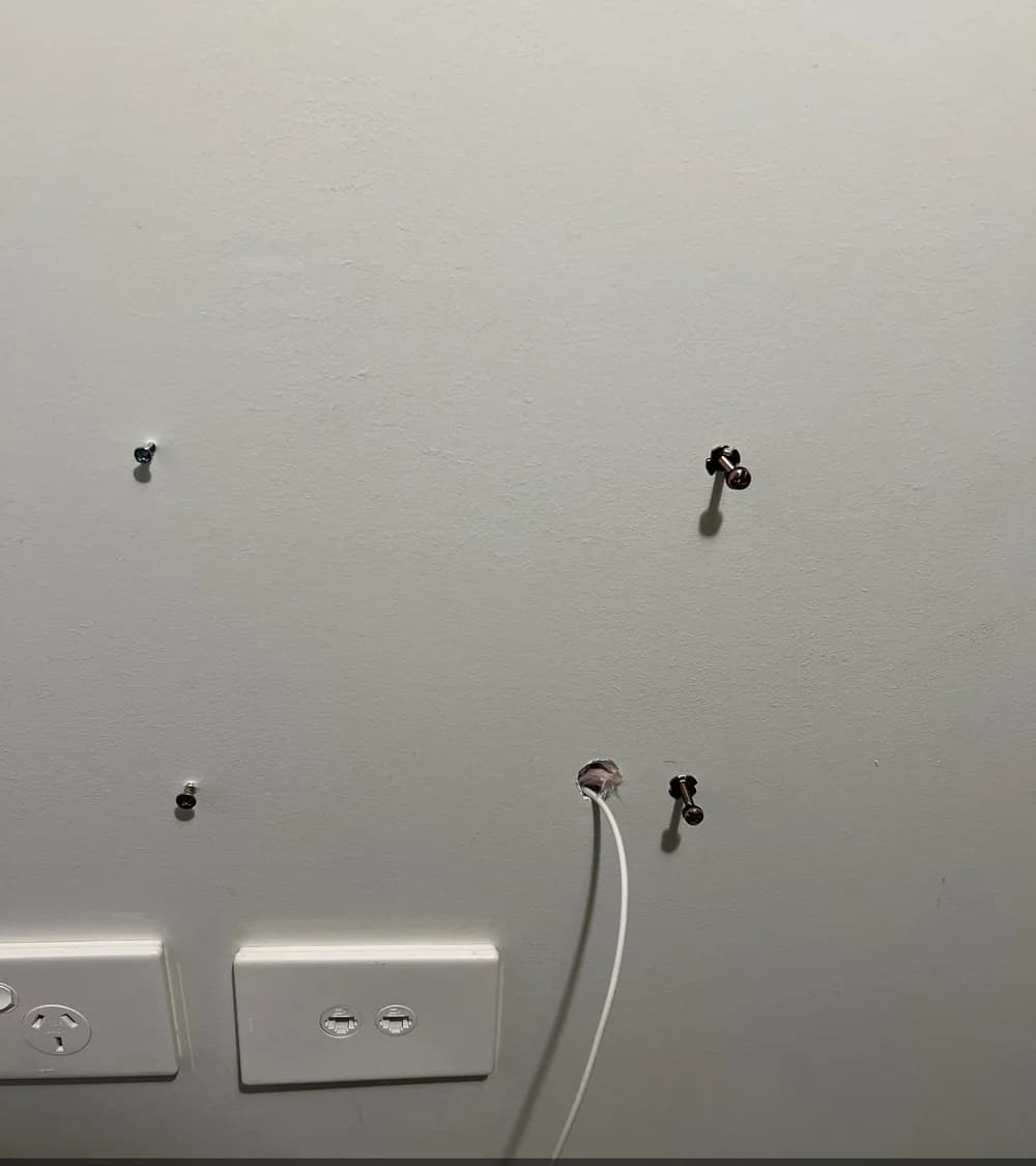 Dual data point and cable installed on an interior wall